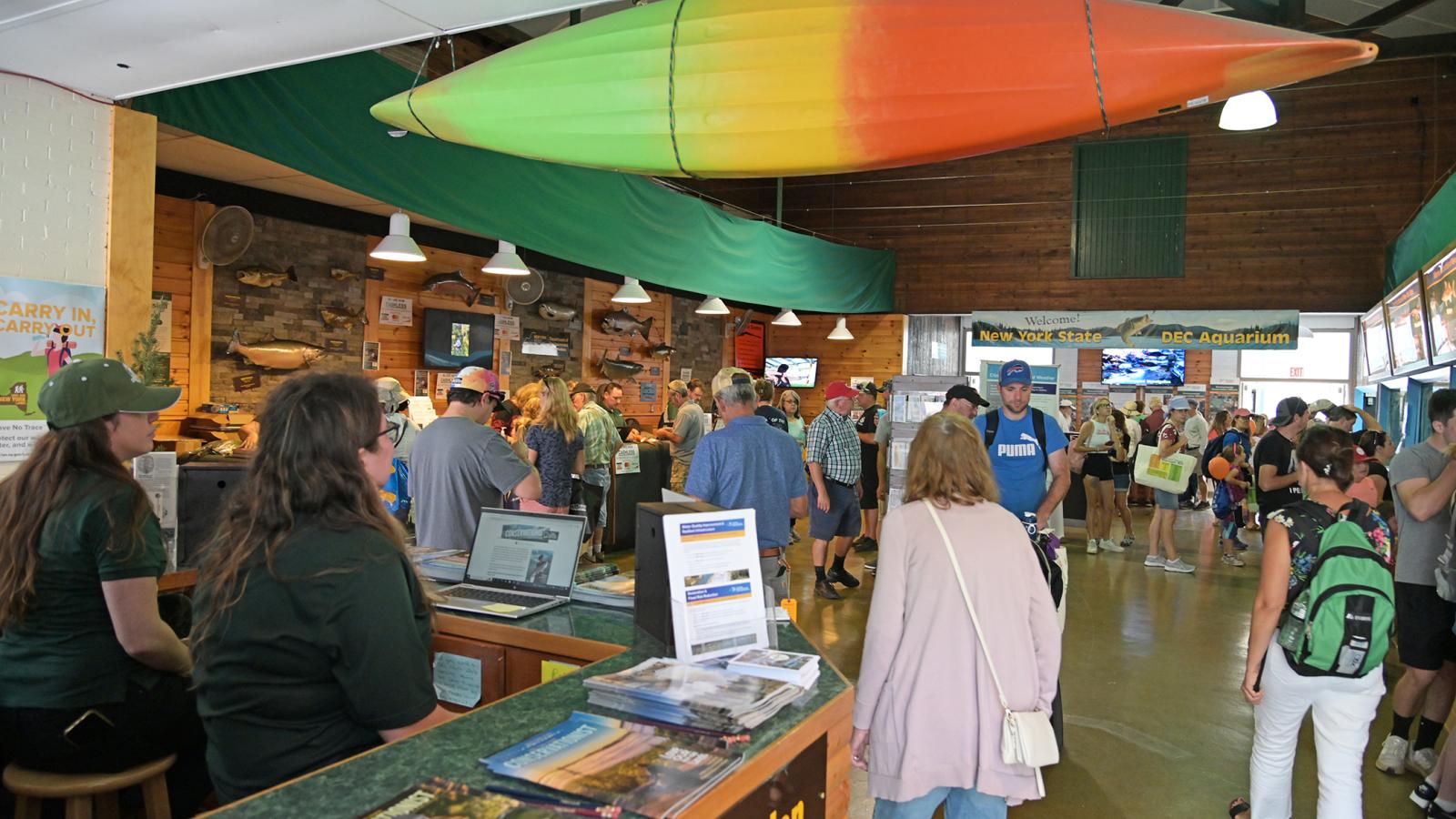 Fairgoers at DEC Aquarium at the New York State Fair.